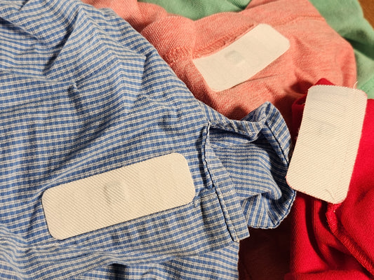 How do I get the iron on tags to stick better?